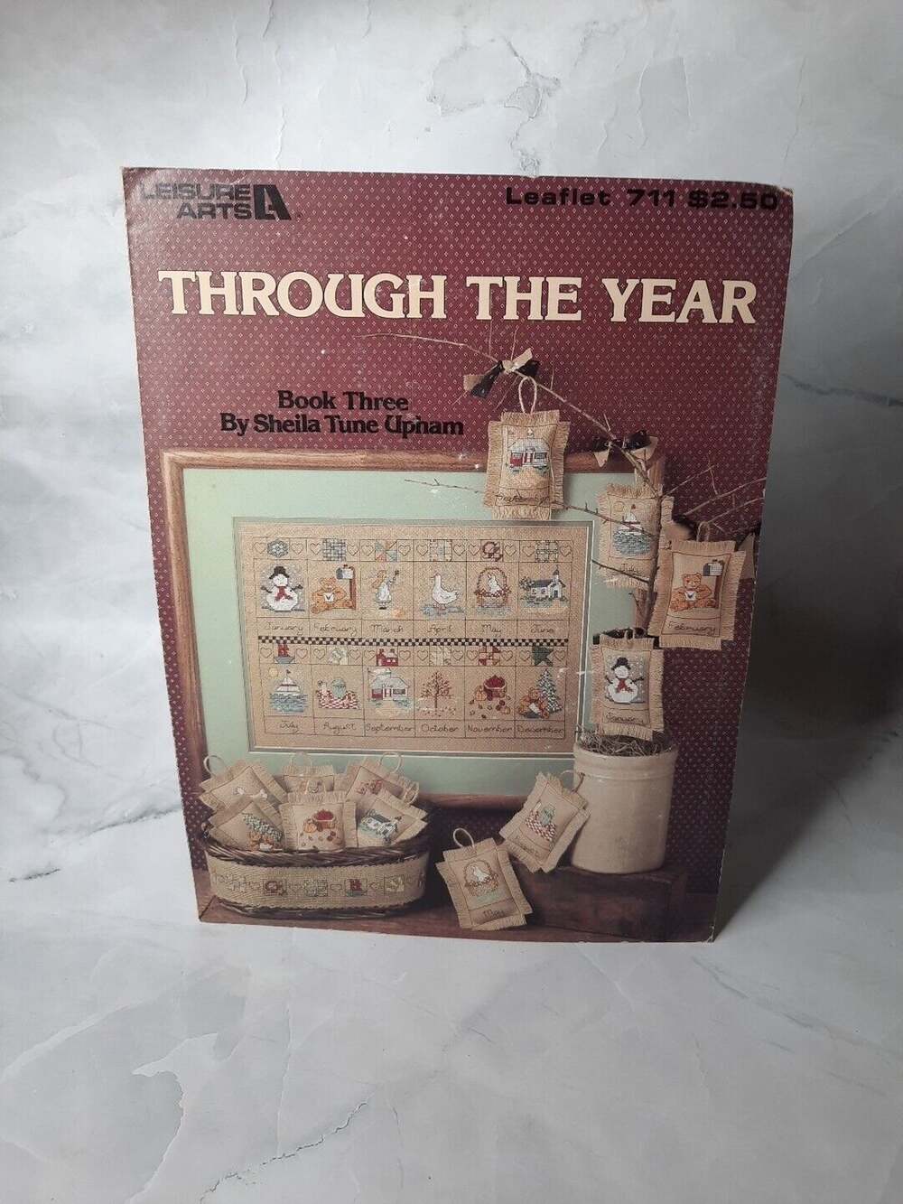 1988 Leisure Arts Cross Stitch Leaflet Through The Year Calendar & Mini Pillows